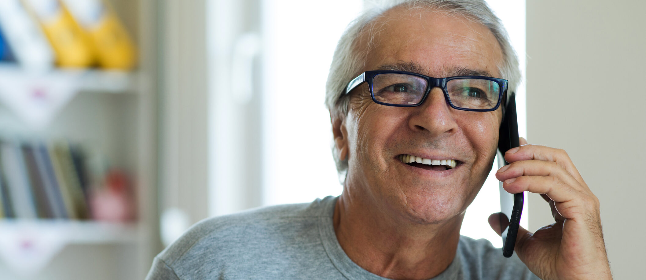 Old man talking having distant communication with doctor getting services